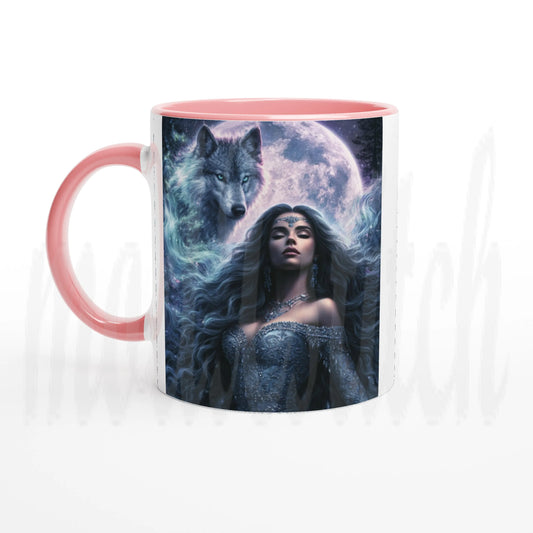 A ceramic mug with a pink handle and interior, featuring a printed fantasy illustration of a woman with long dark hair in a blue gown under a full moon with a wolf behind her.