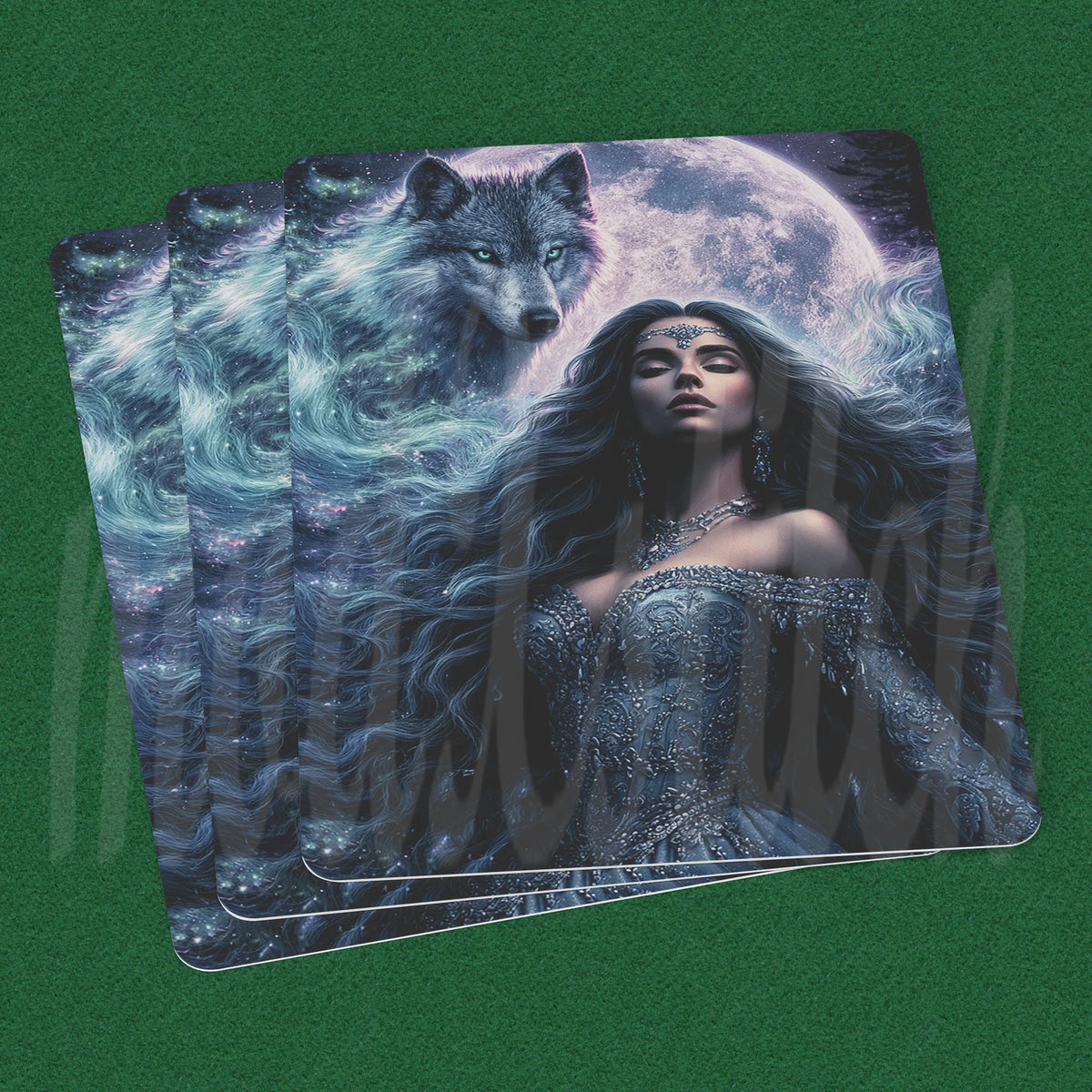 A fan of oracle or tarot cards displaying a fantasy illustration of a woman with long dark hair in a silver gown, with a large wolf and a glowing moon in the background, set against a plain white backdrop.