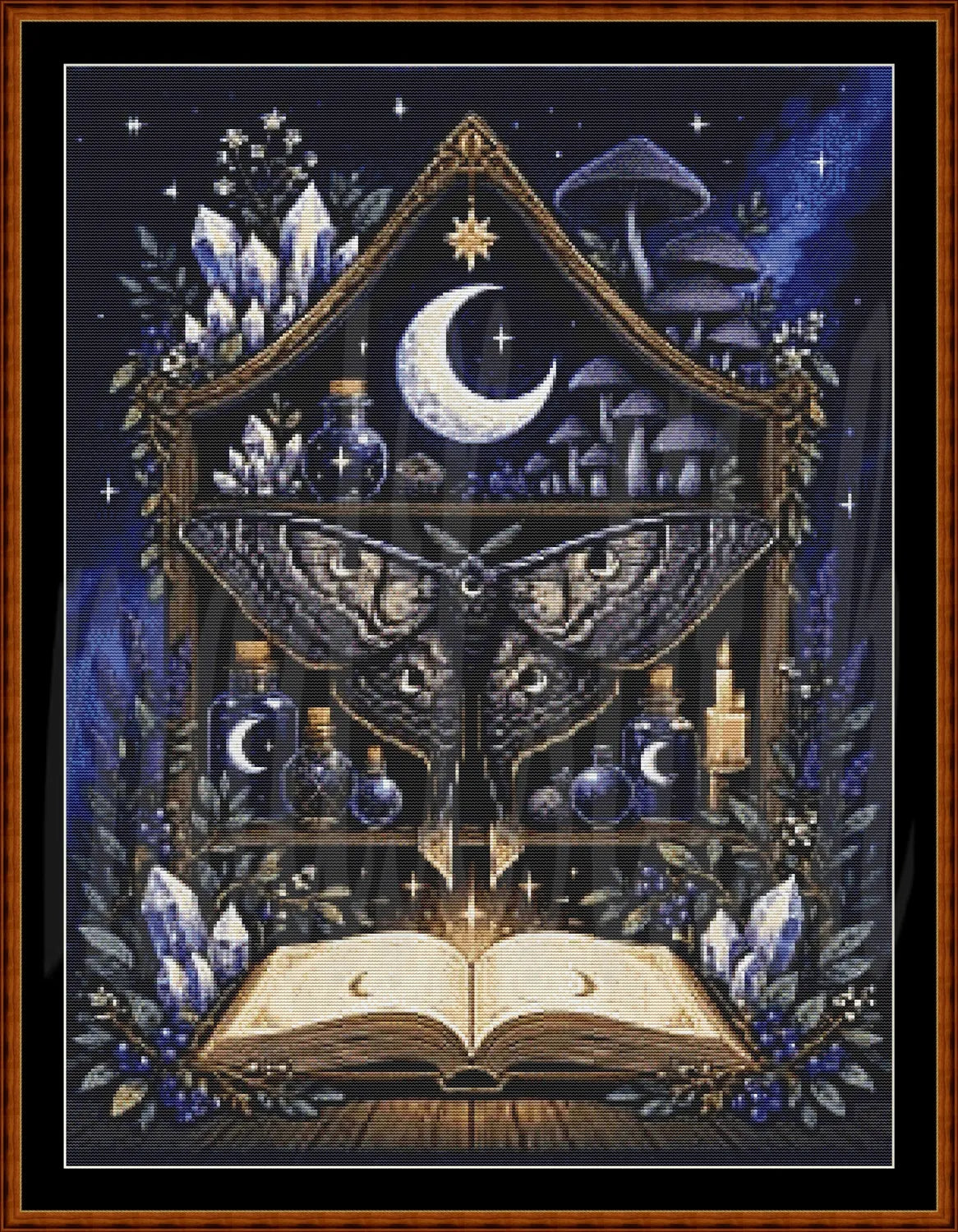 Framed witch's shelf pixel art cross stitch design with crystals, moon, candles, and open book